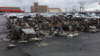 Illustration for article titled More Than A Dozen Fisker Karma Hybrids Caught Fire And Exploded In New Jersey Port After Sandy